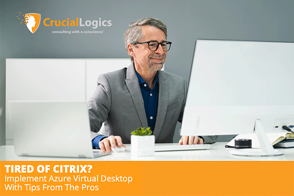 A man wearing glasses and a suit smiles while working at a modern desk with multiple computer monitors; the Crucial Logics logo appears above, and an orange banner reads Tired of Citrix – Implement Azure Virtual Desktop with Tips from the Pros.