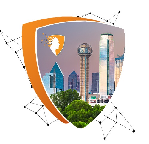 Shield-shaped graphic featuring a city skyline with tall modern buildings and green trees in the foreground – an orange and white logo of a human profile with digital squares appears on the upper left; connected black nodes surround the shield, symbolizing technology, protection, and innovation.