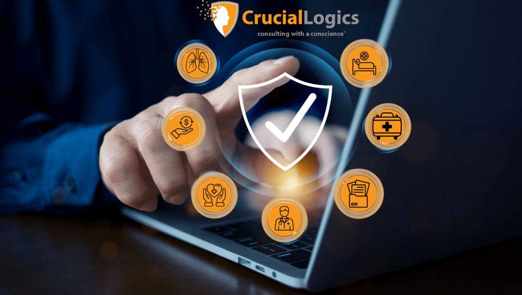 A person’s hand points at a laptop screen displaying a digital shield with a checkmark symbol in the center, surrounded by healthcare-related icons such as a doctor, hospital bed, stethoscope, clipboard, and heart. The “CrucialLogics” logo with the tagline “consulting with a conscience” appears at the top of the image.