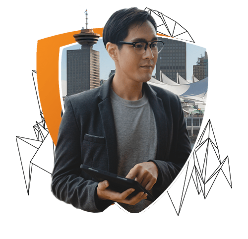 A man wearing glasses and a gray blazer holds a tablet while standing outdoors with city buildings in the background. The image is framed within an orange and white shield shape, symbolizing professionalism and modern technology.