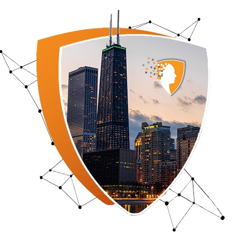 Shield-shaped graphic featuring a city skyline at sunset with tall illuminated buildings reflected on the water – an orange and white logo of a human profile with dispersing squares appears on the upper right; surrounded by connecting black nodes symbolizing technology and protection.